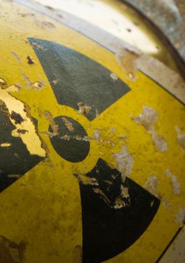 Radioactive symbol on an old metal container