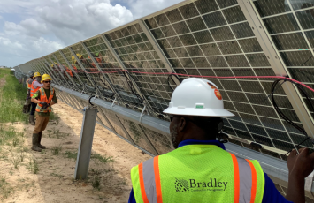 Bradley on solar site with PPE