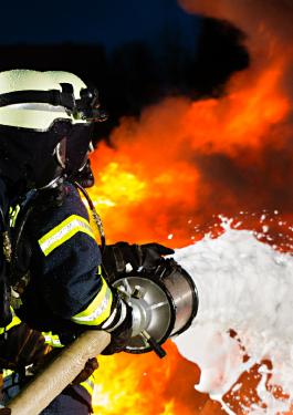 Firefighters using firefighting foam with PFAS