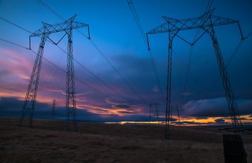 Power Transmission Distribution Lines Blue and Purple Sunset